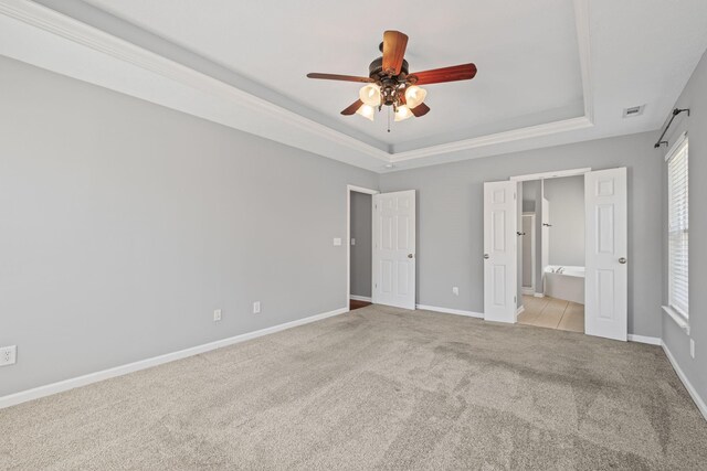 602 Pemberton Ct, Mount Juliet, TN 37122 - unfurnished bedroom featuring a raised ceiling, light colored carpet, ensuite bath, baseboards, and ceiling fan