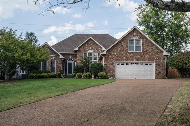 500 Forrest Park Cir, Franklin, TN 37064 - traditional-style home featuring concrete driveway, brick siding, a front yard, an attached garage, and roof with shingles