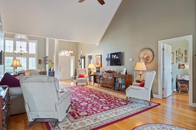 500 Forrest Park Cir, Franklin, TN 37064 - living room featuring a chandelier, high vaulted ceiling, wood finished floors, and a ceiling fan