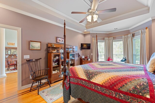 500 Forrest Park Cir, Franklin, TN 37064 - bedroom with light wood finished floors, a raised ceiling, and crown molding