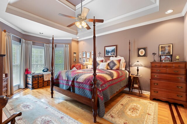 500 Forrest Park Cir, Franklin, TN 37064 - bedroom with a tray ceiling, ornamental molding, light wood-type flooring, recessed lighting, and ceiling fan