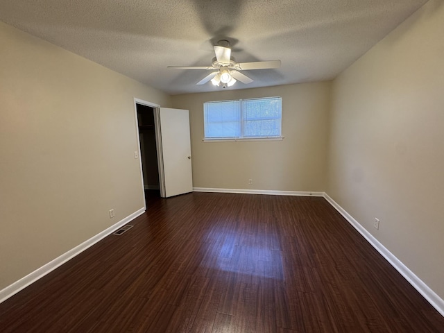 3424 Donna Kay Dr, Nashville, TN 37211 - unfurnished room featuring a ceiling fan, dark wood-type flooring, baseboards, and a textured ceiling