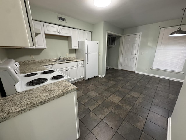 3424 Donna Kay Dr, Nashville, TN 37211 - kitchen with white appliances, white cabinets, baseboards, and a sink