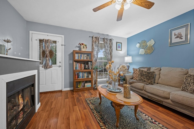 114 Silver Leaf Cir, Dickson, TN 37055 - living area with ceiling fan, a warm lit fireplace, and wood finished floors