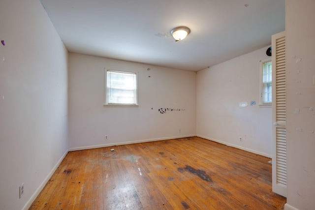 7703 Horn Tavern Rd, Fairview, TN 37062 - spare room featuring wood-type flooring and baseboards