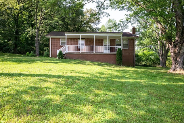 7703 Horn Tavern Rd, Fairview, TN 37062 - ranch-style home with a porch, brick siding, a chimney, and a front lawn