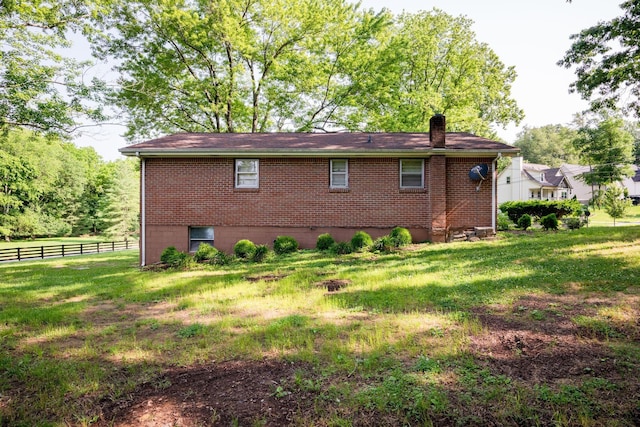 7703 Horn Tavern Rd, Fairview, TN 37062 - view of side of property with a chimney and brick siding