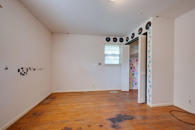 7703 Horn Tavern Rd, Fairview, TN 37062 - unfurnished bedroom featuring wood finished floors