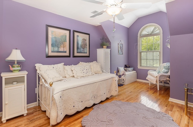 673 Newton Ln, Gallatin, TN 37066 - bedroom with light wood-type flooring, lofted ceiling, and a ceiling fan