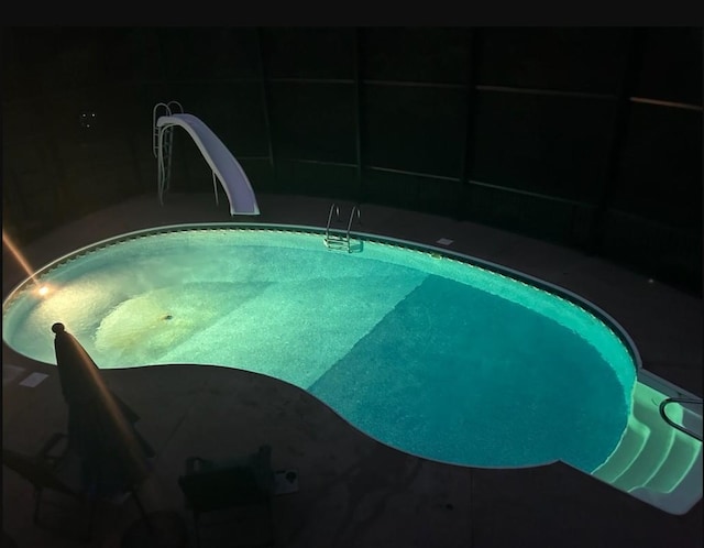 673 Newton Ln, Gallatin, TN 37066 - outdoor pool featuring a water slide and a sink