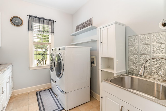 673 Newton Ln, Gallatin, TN 37066 - washroom with separate washer and dryer and cabinet space