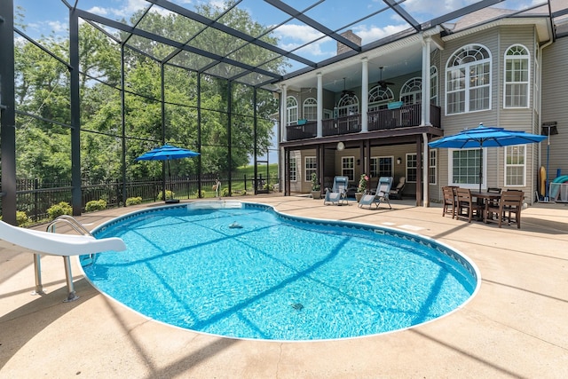 673 Newton Ln, Gallatin, TN 37066 - view of pool featuring a ceiling fan, a water slide, a patio area, and glass enclosure