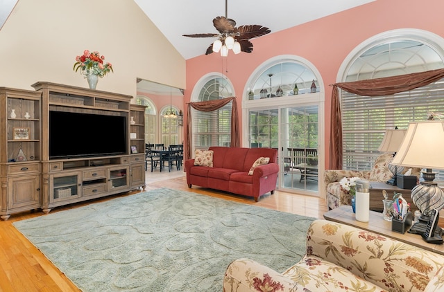 673 Newton Ln, Gallatin, TN 37066 - living room featuring a ceiling fan, high vaulted ceiling, and light wood-type flooring