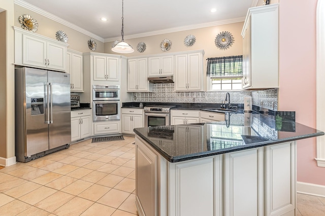 673 Newton Ln, Gallatin, TN 37066 - kitchen with appliances with stainless steel finishes, a peninsula, tasteful backsplash, under cabinet range hood, and crown molding