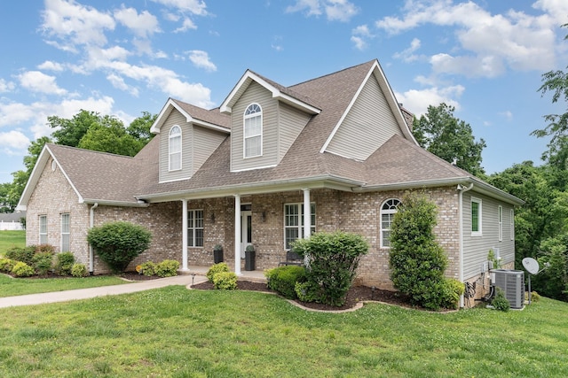 673 Newton Ln, Gallatin, TN 37066 - view of front of home featuring brick siding, a shingled roof, and a front lawn