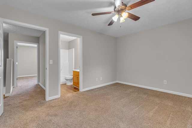 1512 Center Pointe Dr, Murfreesboro, TN 37130 - unfurnished bedroom featuring carpet, baseboards, ensuite bath, and a ceiling fan