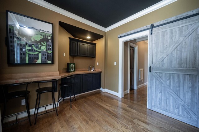 872 Pinnacle Hill Rd, Kingston Springs, TN 37082 - bar area with crown molding, wood finished floors, and a barn door