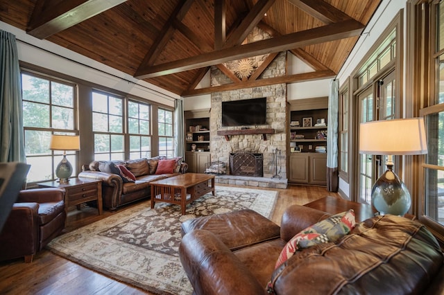 872 Pinnacle Hill Rd, Kingston Springs, TN 37082 - living area with a wooden ceiling with exposed beams, healthy amount of natural light, hardwood / wood-style floors, a fireplace, and high vaulted ceiling