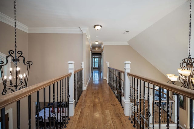 872 Pinnacle Hill Rd, Kingston Springs, TN 37082 - hall with a chandelier, an upstairs landing, wood finished floors, crown molding, and lofted ceiling