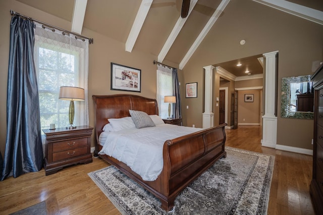 872 Pinnacle Hill Rd, Kingston Springs, TN 37082 - bedroom featuring decorative columns, beamed ceiling, wood finished floors, high vaulted ceiling, and crown molding
