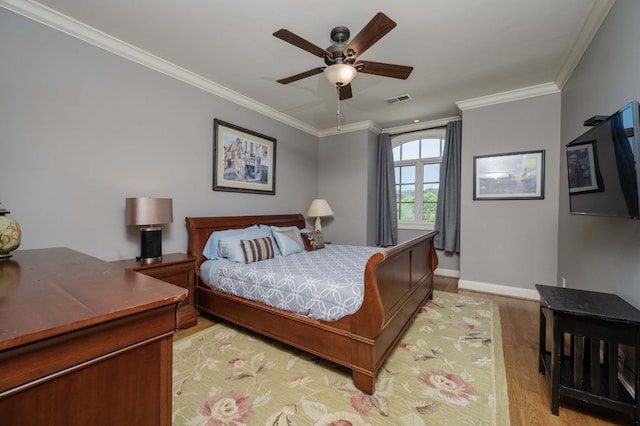 872 Pinnacle Hill Rd, Kingston Springs, TN 37082 - bedroom featuring light wood-style floors, crown molding, and a ceiling fan
