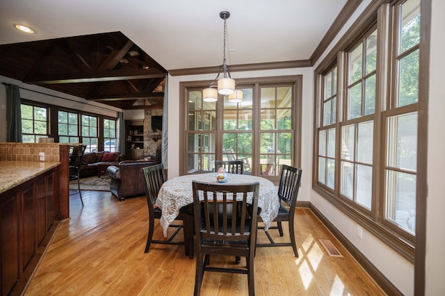 872 Pinnacle Hill Rd, Kingston Springs, TN 37082 - dining area featuring light wood-type flooring and ornamental molding