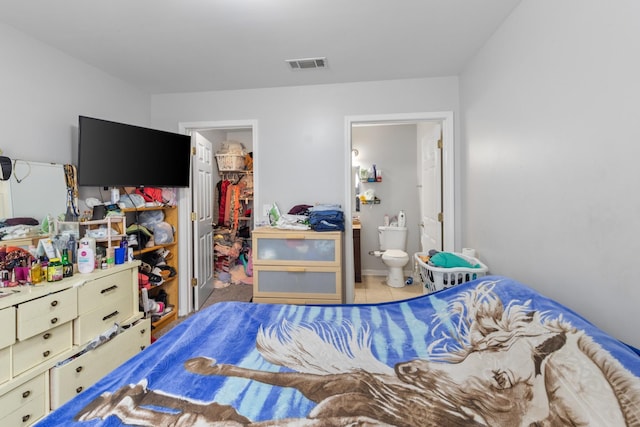 4145 Providence Park Ln, Nashville, TN 37211 - tiled bedroom with a walk in closet, a closet, and ensuite bathroom