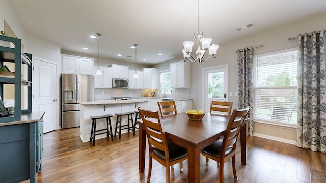 2809 Kaye Dr, Thompsons Station, TN 37179 - dining space featuring a chandelier, hardwood / wood-style floors, and recessed lighting