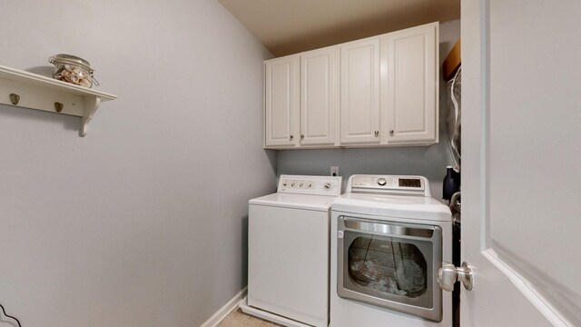 2809 Kaye Dr, Thompsons Station, TN 37179 - laundry room with washing machine and clothes dryer and cabinet space