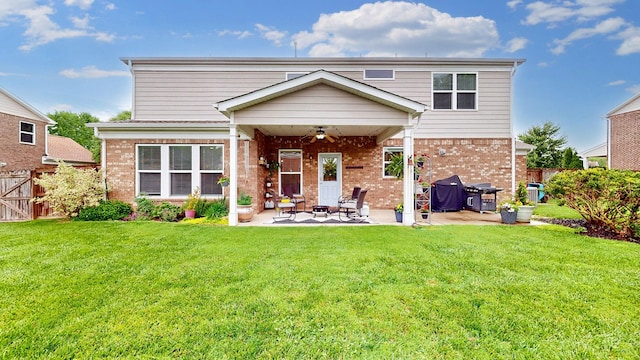 2809 Kaye Dr, Thompsons Station, TN 37179 - rear view of property featuring ceiling fan, a patio area, and brick siding