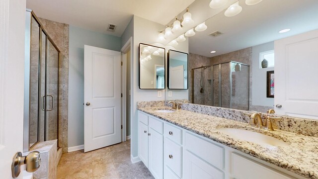 2809 Kaye Dr, Thompsons Station, TN 37179 - full bathroom with double vanity and a shower stall