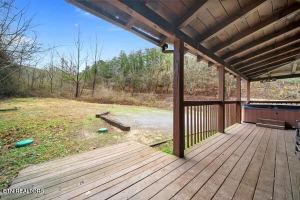 1999 E Mountain View Way, Sevierville, TN 37862 - wooden deck with a hot tub