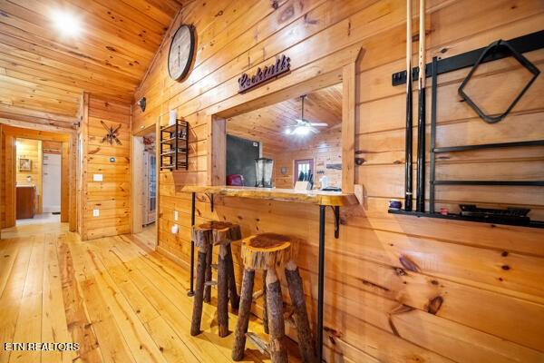 1999 E Mountain View Way, Sevierville, TN 37862 - indoor dry bar featuring wood walls, wood-type flooring, vaulted ceiling, wood ceiling, and ceiling fan