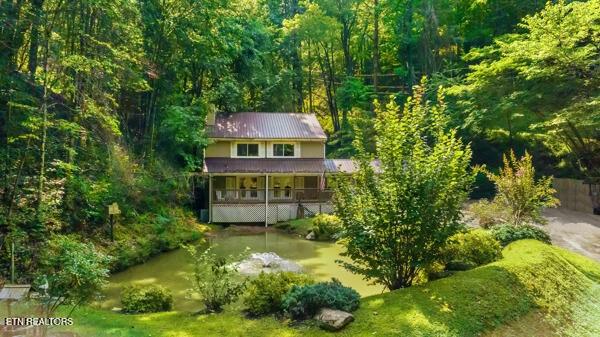 3127 Emerald Springs Loop, Sevierville, TN 37862 - view from above of property featuring a heavily wooded area