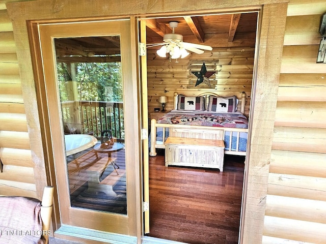 4196 Mountain Rest Way, Sevierville, TN 37876 - bedroom featuring wooden walls and access to outside