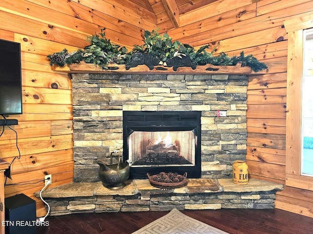 4196 Mountain Rest Way, Sevierville, TN 37876 - detailed view of wood finished floors, wooden walls, and an outdoor stone fireplace
