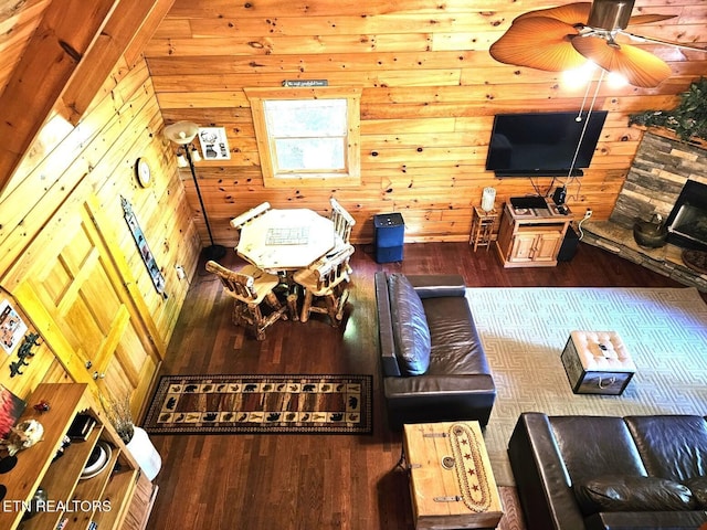 4196 Mountain Rest Way, Sevierville, TN 37876 - living area with wood finished floors, wooden walls, and ceiling fan