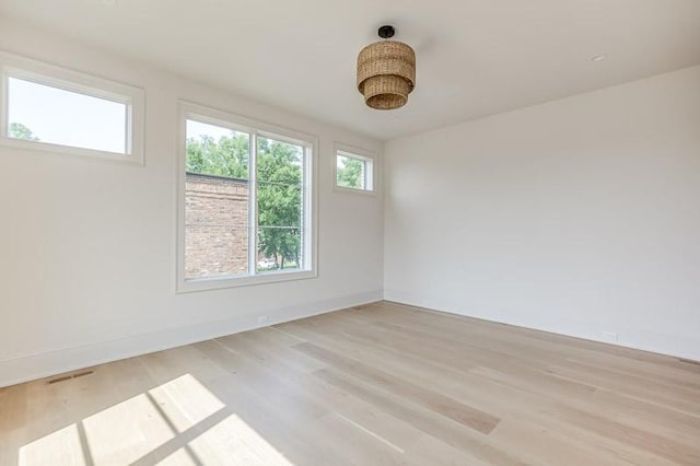 1302B Pillow St, Nashville, TN 37203 - empty room featuring light wood finished floors and baseboards