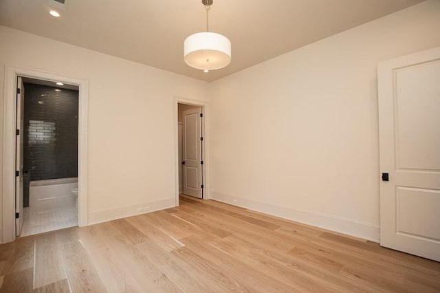 1302B Pillow St, Nashville, TN 37203 - spare room featuring light wood-style flooring, baseboards, and recessed lighting