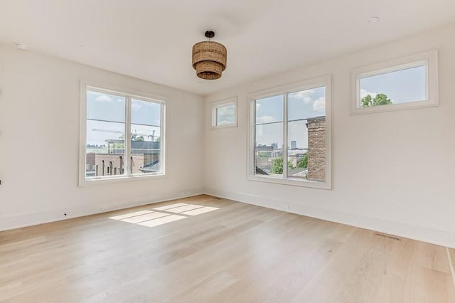 1302B Pillow St, Nashville, TN 37203 - spare room featuring wood finished floors and baseboards