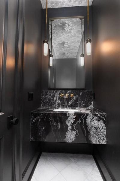 1302B Pillow St, Nashville, TN 37203 - bathroom featuring marble look tile flooring
