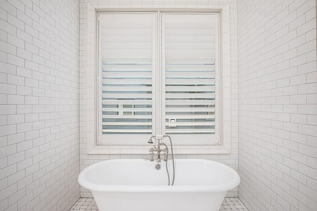 1302B Pillow St, Nashville, TN 37203 - full bathroom featuring tile walls, a freestanding tub, and tile patterned floors