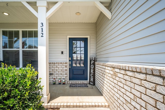 312 Whisper Wood Way, Lebanon, TN 37087 - entrance to property featuring covered porch and brick siding