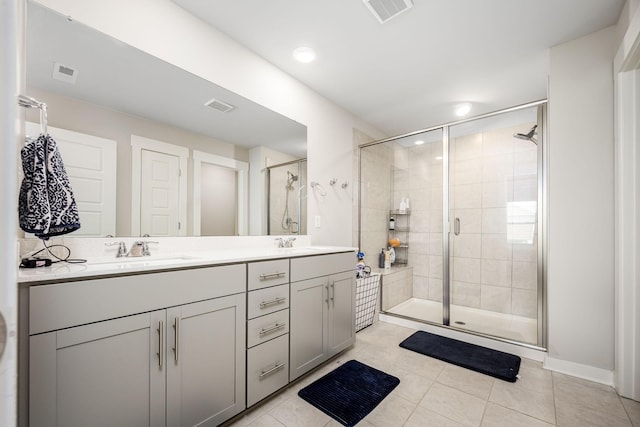 312 Whisper Wood Way, Lebanon, TN 37087 - bathroom featuring tile patterned flooring, double vanity, a stall shower, and recessed lighting