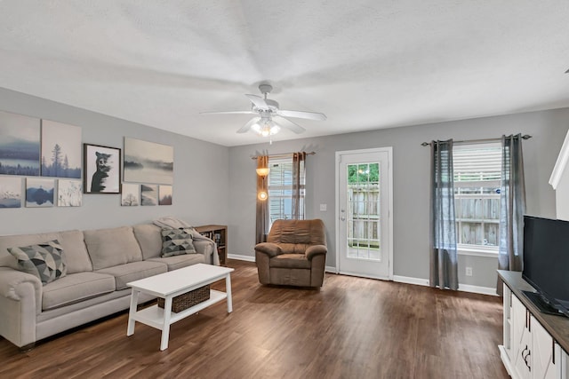 243 Shoshone Pl, Murfreesboro, TN 37128 - living area with dark wood finished floors and a ceiling fan