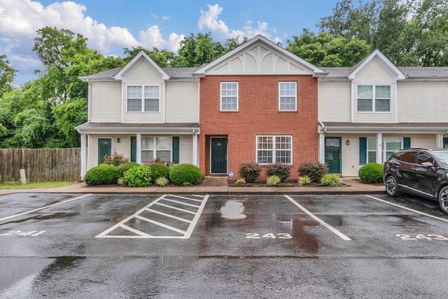 243 Shoshone Pl, Murfreesboro, TN 37128 - view of property with uncovered parking and brick siding