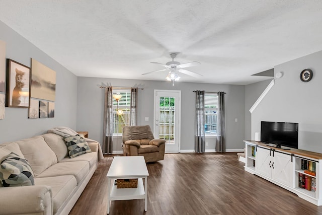 243 Shoshone Pl, Murfreesboro, TN 37128 - living room featuring a ceiling fan, dark wood finished floors, and a textured ceiling