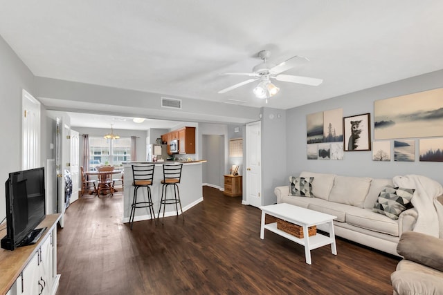 243 Shoshone Pl, Murfreesboro, TN 37128 - living area featuring dark wood-style flooring and ceiling fan