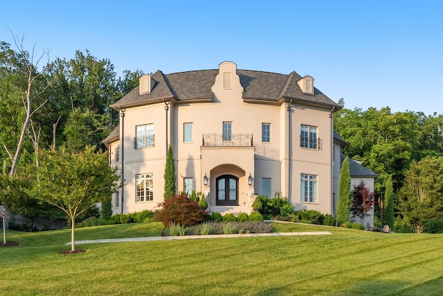 1024 Vaughn Crest Dr, Franklin, TN 37069 - french provincial home with a balcony, french doors, stucco siding, and a front yard