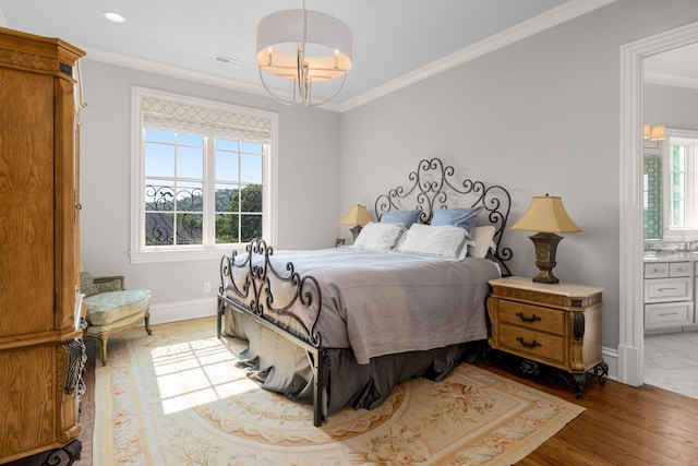 1024 Vaughn Crest Dr, Franklin, TN 37069 - bedroom featuring ornamental molding, connected bathroom, recessed lighting, a chandelier, and wood finished floors